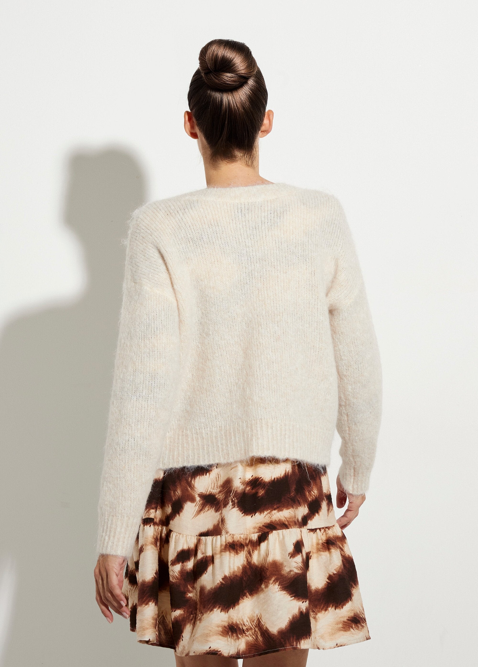 Chaleco_de_lana_cálido_con_botones_joya_Crudo_DO1_slim