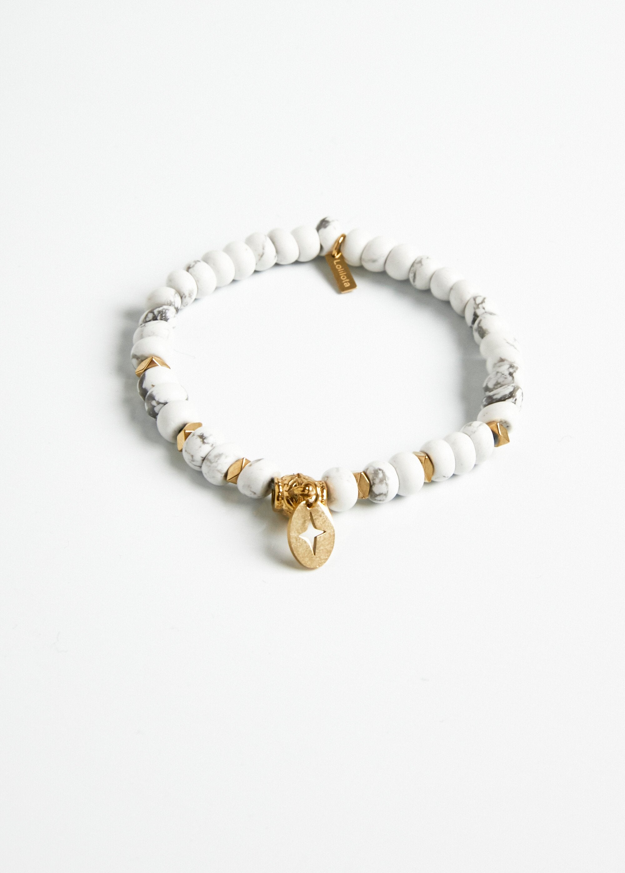 Pulsera_de_perlas._Blanc_DE1_slim