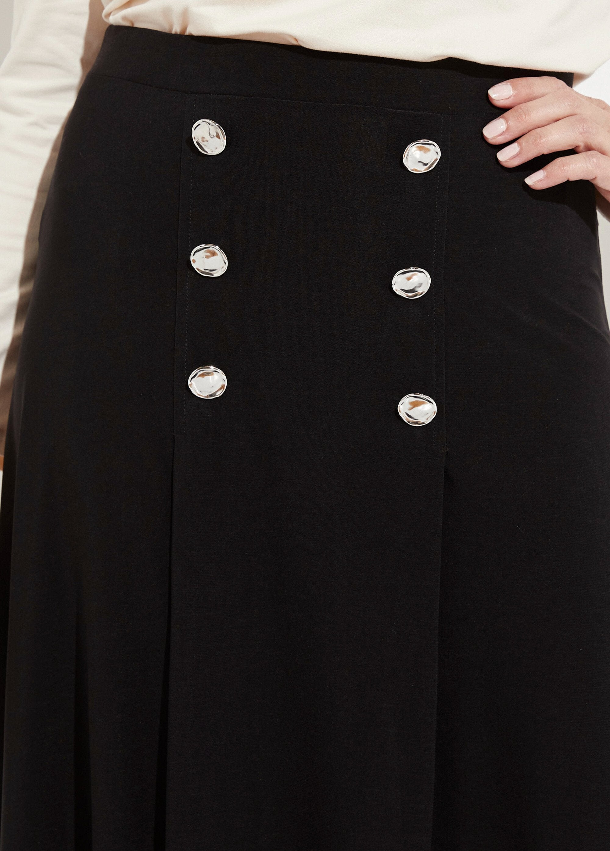 Falda_evasé_midi_de_punto_liso_con_puente_Negro_DE1_slim