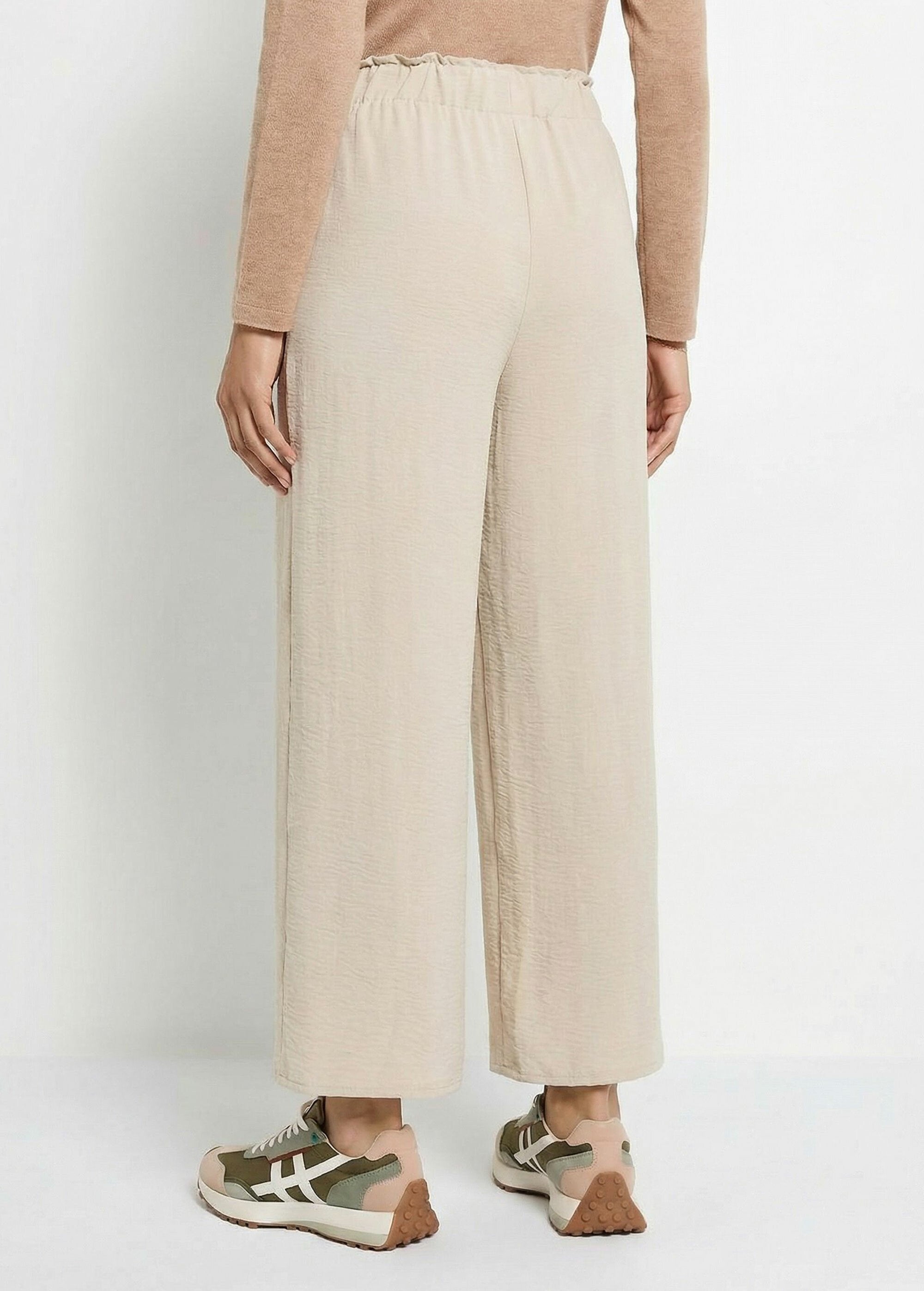 Pantalones_de_crepé_fluidos_de_pierna_ancha_Beige_DO1_slim
